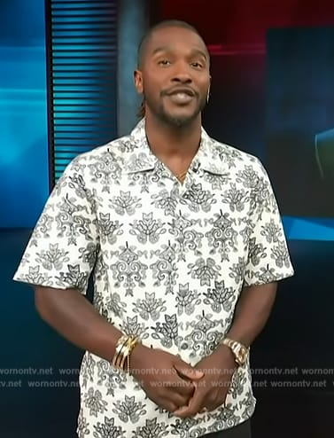 Scott’s white floral print shirt on Access Hollywood