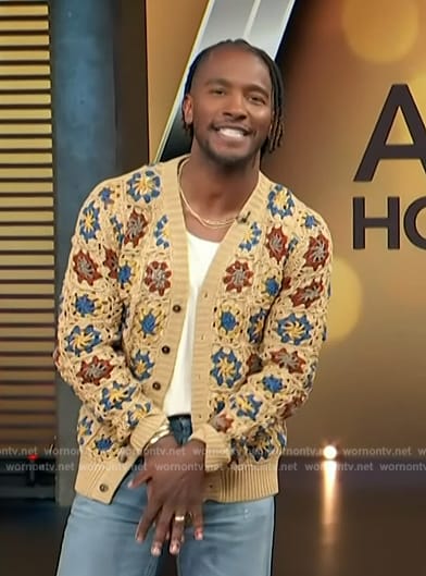 Scott’s beige floral crochet cardigan on Access Hollywood