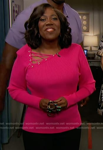 Sheryl's pink lace-up detail sweater on The Talk