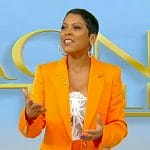 Tamron’s white lace bustier top and blazer on Tamron Hall Show