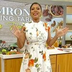 Tamron’s white floral print sleeveless dress on Tamron Hall Show