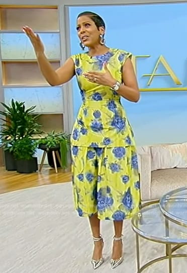 Tamron's yellow floral print top and skirt on Tamron Hall Show