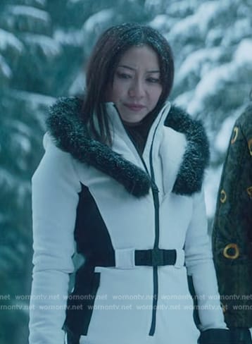 Teddy’s white contrast trim ski jumpsuit on Death and Other Details