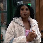 Trina’s cream fur jacket, pink crochet knit cardigan, and studded denim bag on General Hospital