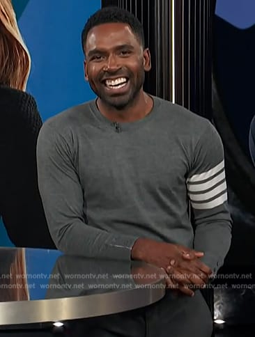 Justin's gray sleeve stripe sweater on E! News