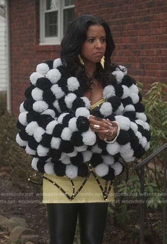 Wickie's black and white pom-pom jacket on Girls5eva