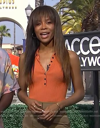 Zuri’s orange ribbed top on Access Hollywood