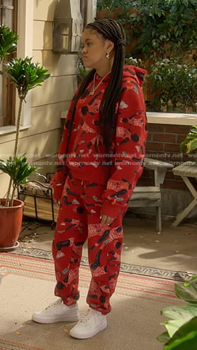 Aaliyah's red printed hoodie and sweatpants on The Upshaws