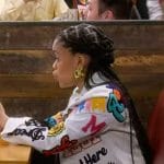 Aaliyah’s white patchwork jacket on The Upshaws