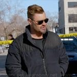 Adam’s navy padded jacket on Chicago PD