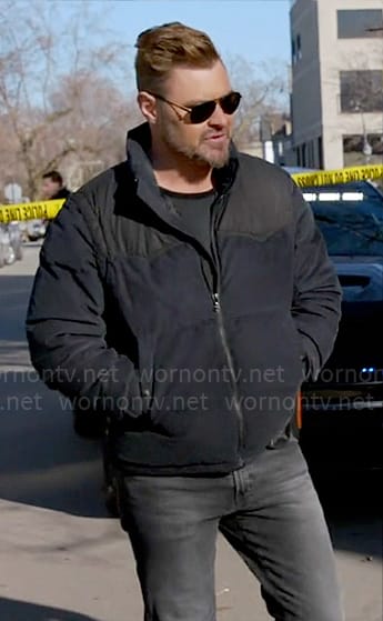 Adam's navy padded jacket on Chicago PD