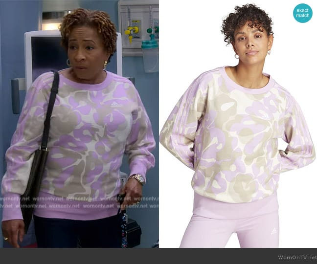 Adidas Stripe Floral Graphic Fleece Sweatshirt worn by Lucretia Turner (Wanda Sykes) on The Upshaws