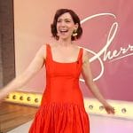 Carrie Preston’s orange sleeveless dress on Sherri