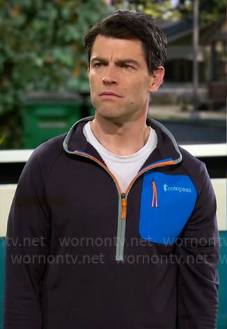 Dave's half-zip pullover with blue pocket on The Neighborhood