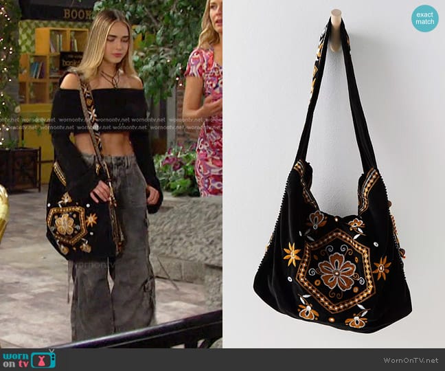 Free People Vic Velvet Slouchy Bag in Moody Midnight worn by Holly Jonas (Ashley Puzemis) on Days of our Lives