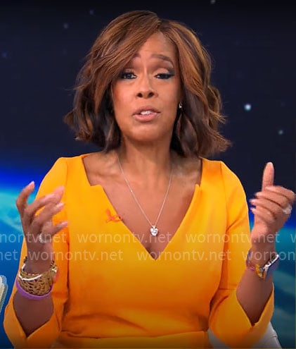 Gayle King's orange v-neck dress on CBS Mornings