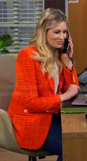 Gemma's orange tweed jacket with gold buttons on The Neighborhood