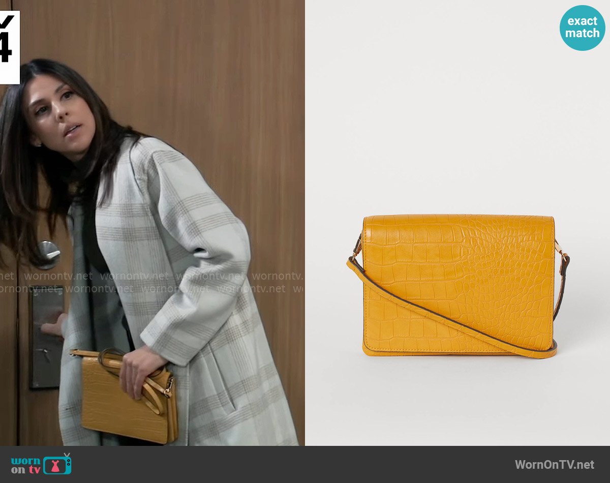 H&M Shoulder Bag in Dark yellow/crocodile pattern worn by Kristina Corinthos-Davis (Kate Mansi) on General Hospital