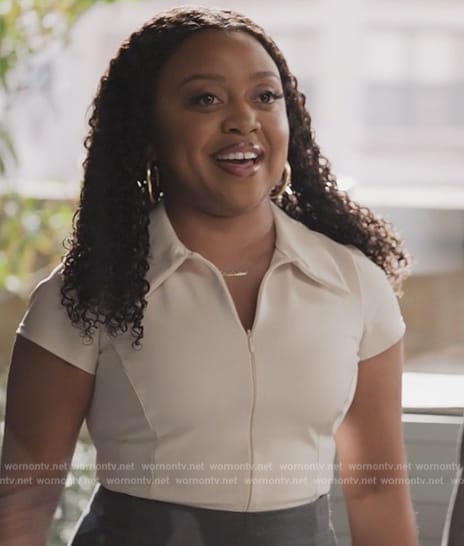 Zara's white zip front top on Abbott Elementary