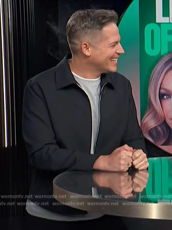 Jason’s gray zip front jacket on E! News