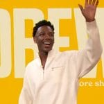 Jerrod Carmichael’s white half zip sweater on The Drew Barrymore Show