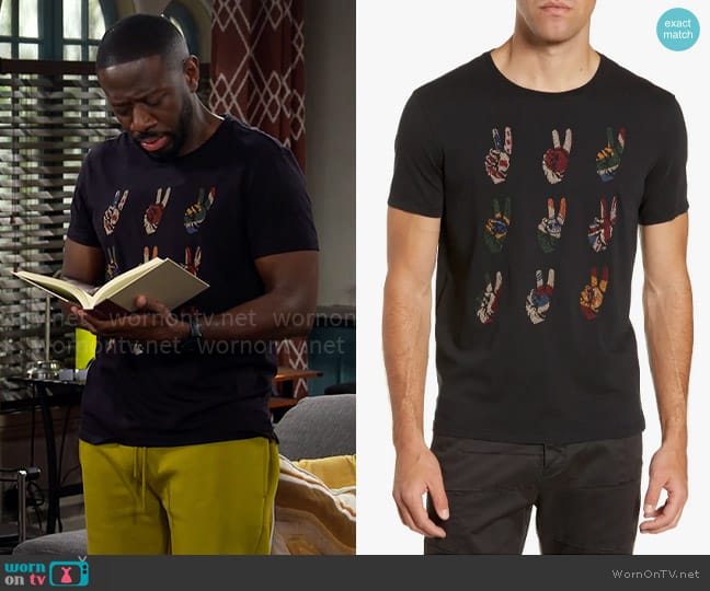 John Varvatos Star USA Peace Hand Embroidered T-Shirt worn by Malcom (Sheaun McKinney) on The Neighborhood