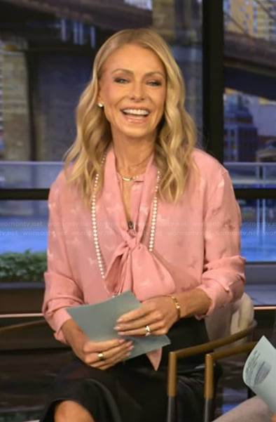 Kelly’s pink tie neck blouse on Live with Kelly and Mark