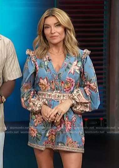 Kit's blue floral print romper on Access Hollywood