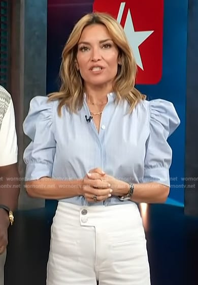 Kit's blue puff sleeve top on Access Hollywood