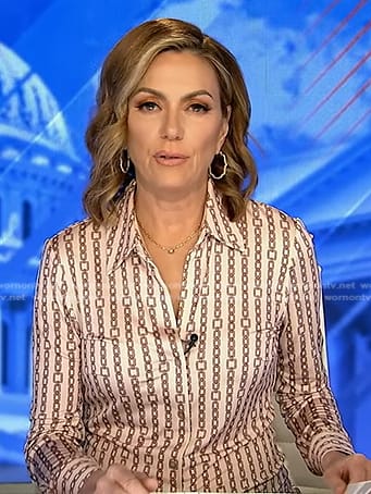 Kyra Phillips’s beige chain print shirt on Good Morning America