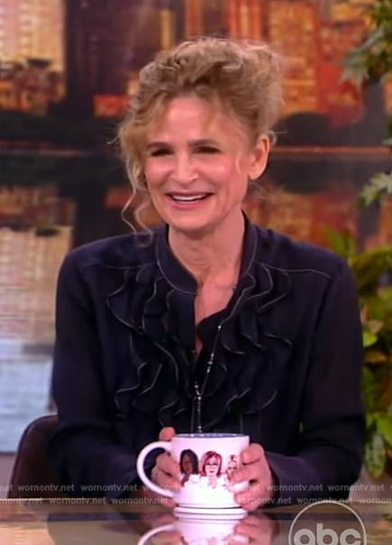 Kyra Sedgwick's navy ruffle blouse on The View