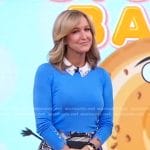 Lara’s blue button cuff sweater and print mini skirt on Good Morning America