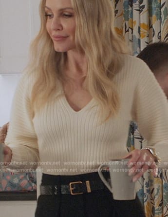 Laura's white puff sleeve sweater on All American