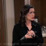 Lois's black leather detail shirt and studded bag on General Hospital