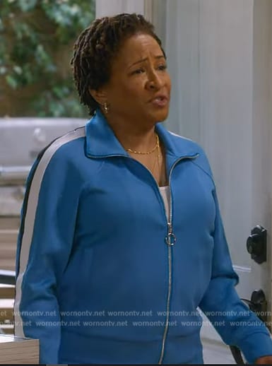 Lucretia's blue side stripe track jacket and pants on The Upshaws