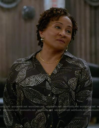 Lucretia's black floral print shirt on The Upshaws