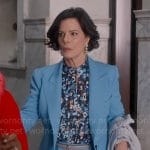 Margaret’s floral pleated blouse and blue suit on So Help Me Todd