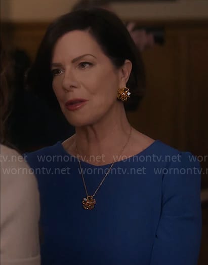 Margaret's flower earrings and pendant necklace on So Help Me Todd