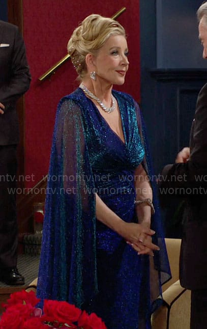 Nikki's metallic blue cape dress on The Young and the Restless