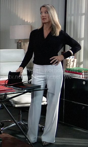 Nina's black wrap top and white pants on General Hospital