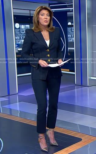 Norah’s denim blazer with gold buttons on CBS Evening News