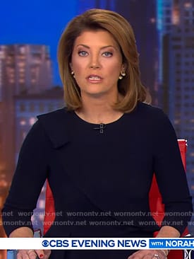 Norah’s navy ruffle trim dress on CBS Evening News