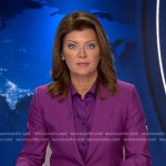 Norah’s purple tie neck blouse and suit on CBS Evening News