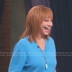 Reba’s blue v-neck sweater on The Voice