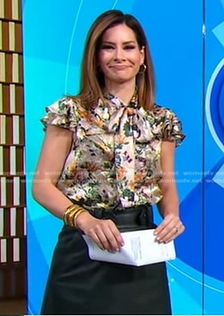 Rebecca’s floral ruffle top and black leather skirt on Good Morning America