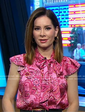 Rebecca’s pink print tie neck top on Good Morning America