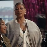 Robyn's grey bomber jacket and printed cardigan on The Equalizer