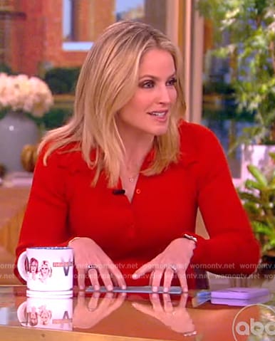 Sara’s red ruffle trim ribbed mini dress on The View