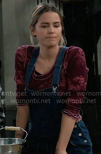 Sasha's purple and pink printed top with denim overalls on General Hospital