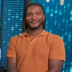 Scott’s orange knit polo on Access Hollywood